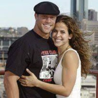 Both Gabe Kapler and Lisa Jansen are hugging each other in the picture.